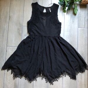Free people sleeveless handkerchief lace dress in muted black. Size S